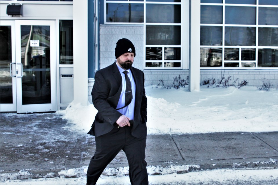 Const. Neal Soltys leaves the hearing where he was found guilty of Discreditable Conduct. (Ian Kaufman, Tbnewswatch)