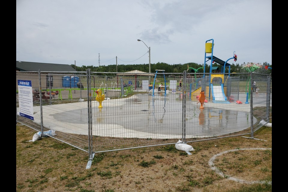 About a dozen children were enjoying the reopened splash pad on Huron Ave. in the early afternoon of July 8, 2020 (tbnewswatch.com)