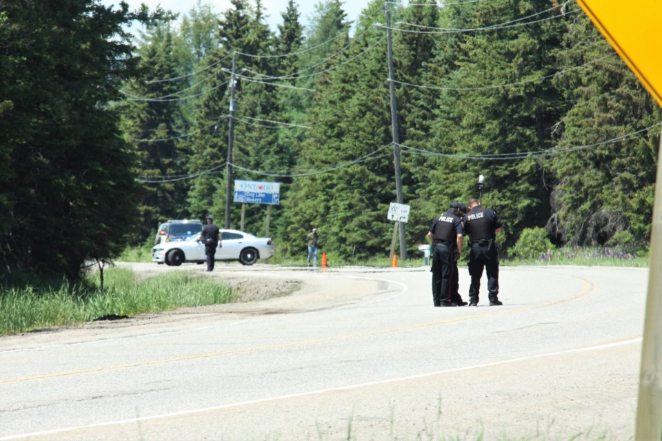 Thunder Bay police conduct an investigation that closed Highway 102 Sunday afternoon. (Photos by Ian Kaufman, tbnewswatch.com)