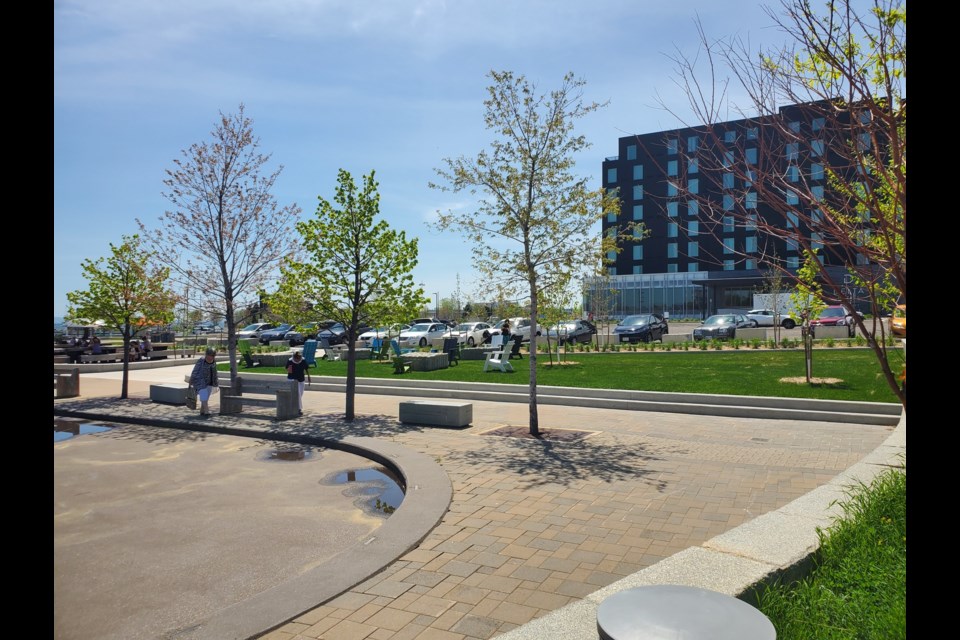 Waterfront Market Square Phase 2 work includes improvements to the space between the splash pad/skating rink and the Delta hotel (Tbnewswatch photo)