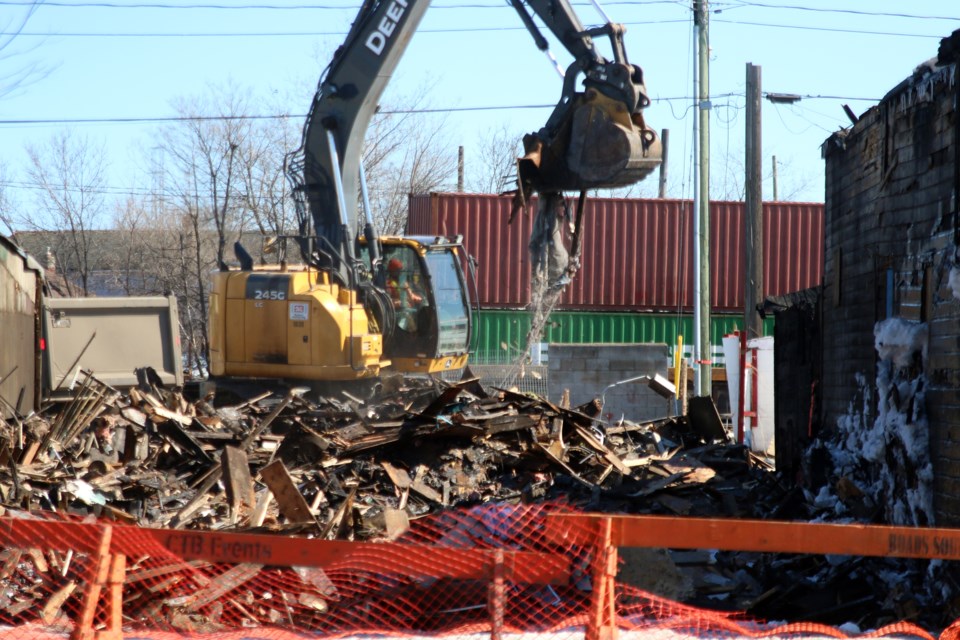 Rizzo's Cabinets on Simpson Street was being torn down on Thursday. 