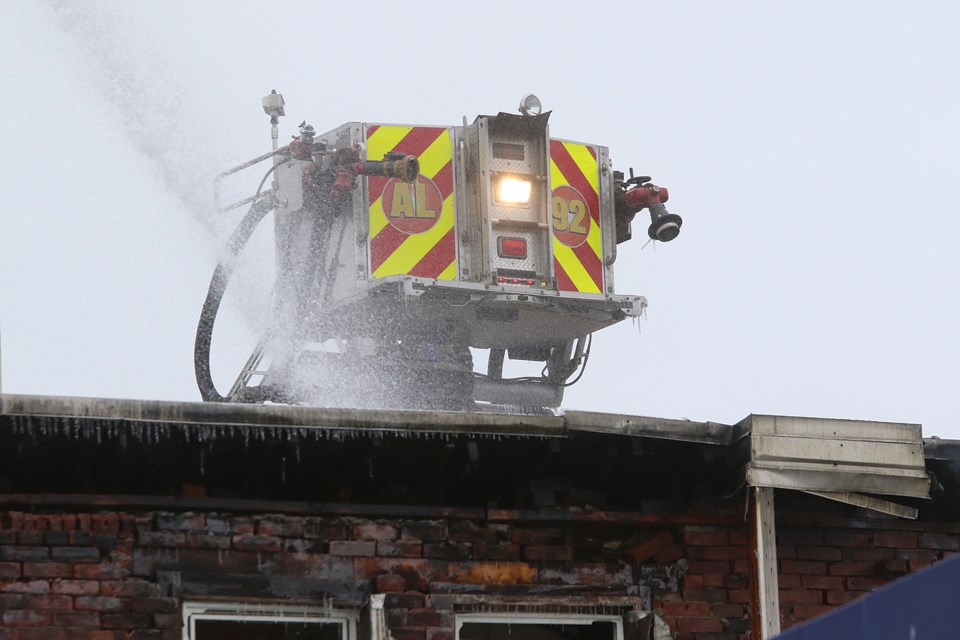 Thunder Bay Fire Rescue crews on Monday, March 2, 2020, continue to battle a fire that broke out on Sunday night at the former Odd Fellows Hall on south May Street. (Leith Dunick, tbnewswatch.com)