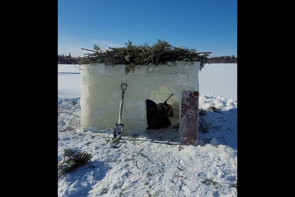 Patrick Elvish and Abby Stezenko spent eight hours building this ice-block hut near Upsala (submitted photo)