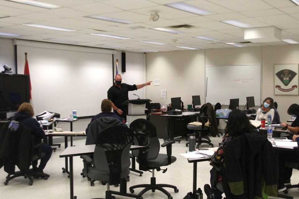 Instructor Shawn McCowell leads a training session for current and former first responders from across the northwest on how to participate in the Boots on the Ground peer support program. (Photos by Doug Diaczuk - Tbnewswatch.com). 