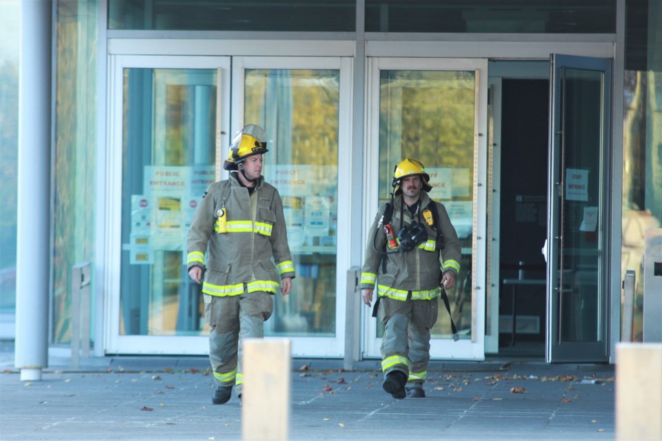 Firefighters emerge from the Thunder Bay Courthouse Sunday evening (Photos by Ian Kaufman, tbnewswatch.com)