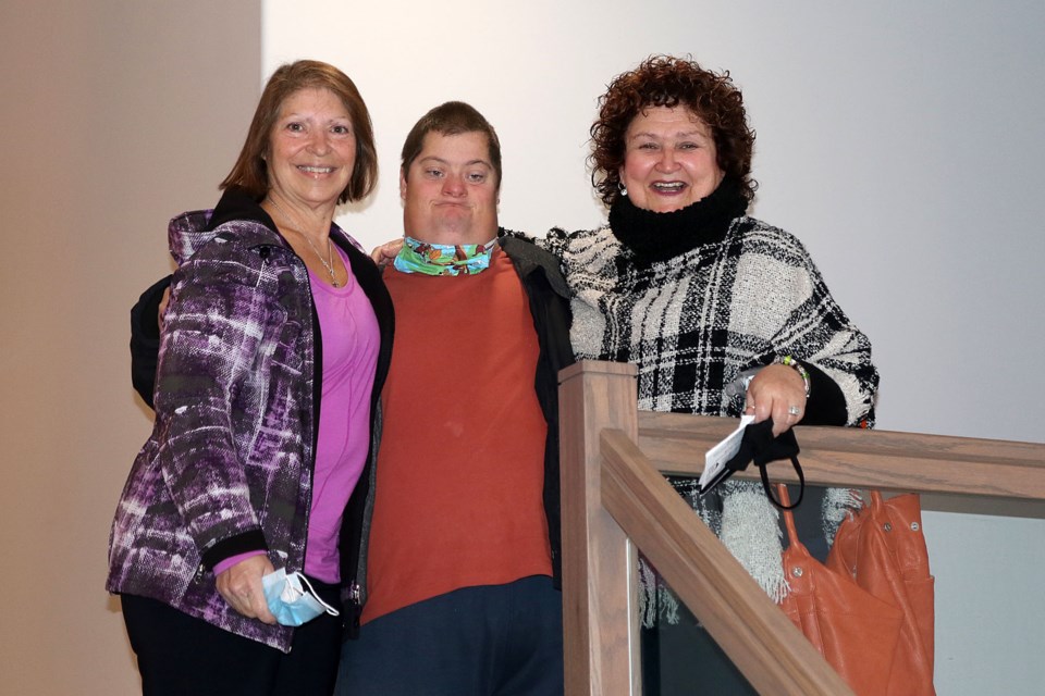 Paulette Husfeldt (from left), son Erich Husfeldt and Shirley MacDonell on Monday, Oct. 12, 2020 celebrate winning the $589,000 grand prize in the Fort Wililam Rotary House Lottery draw. (Leith Dunick, tbnewswatch.com)