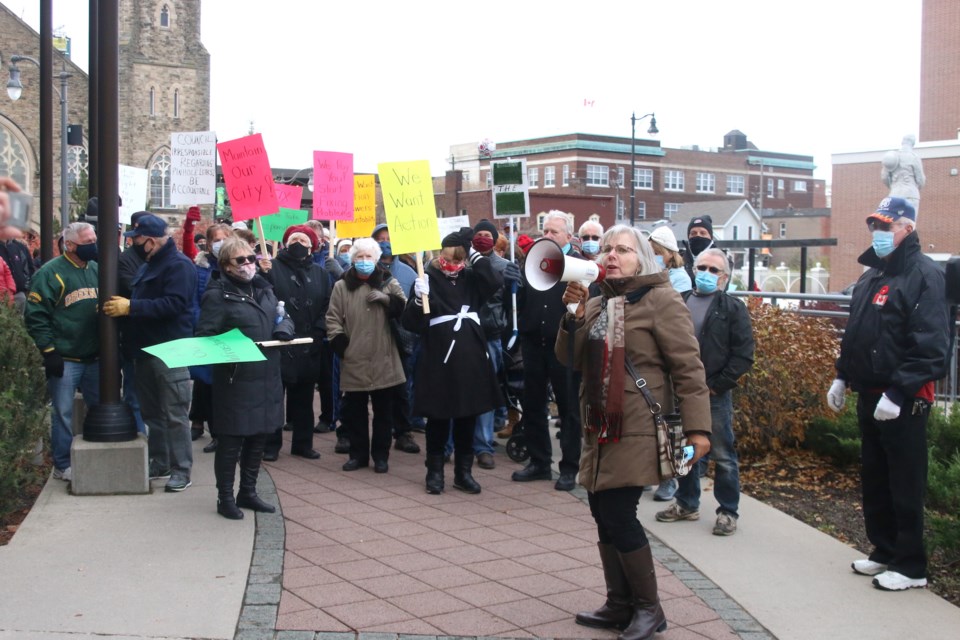 More than 100 people gathered outside Thunder Bay City Hall to demand answers on the issue of pinhole leaks in copper water pipes. (Photos by Doug Diaczuk - Tbnewswatch.com). 