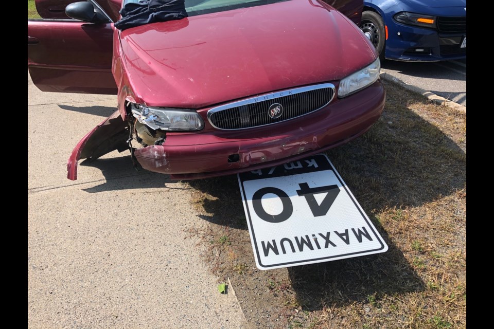 A driver has been arrested and charged after getting into multiple collisions, including one near an elementary school. (Police handout). 