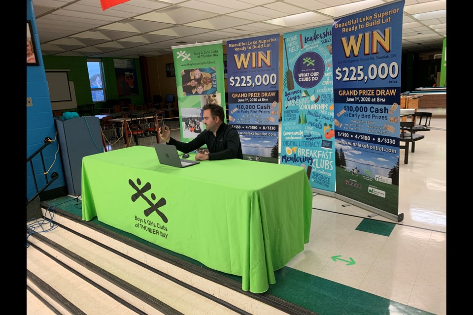 Mike Tallari gets set on Friday, Sept. 18, 2020 at the Boys and Girls Club to announce the winner of the Win a Lakeftont Lot draw. (Leith Dunick, tbnewswatch.com)