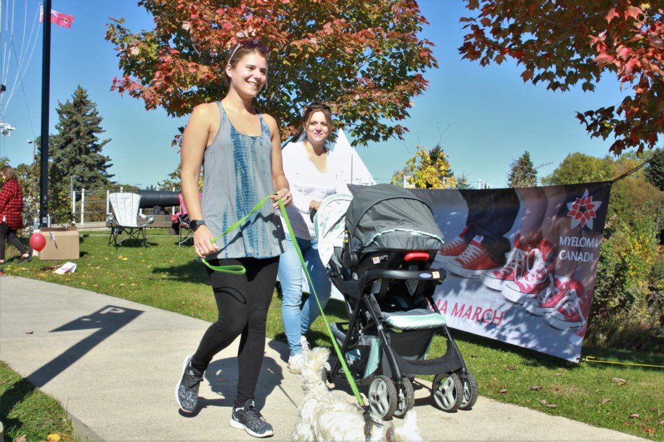 Nikki Stein, left, walks in the Multiple Myeloma March with Allison McLellan and her son Liam Sunday. (Ian Kaufman, tbnewswatch.com)