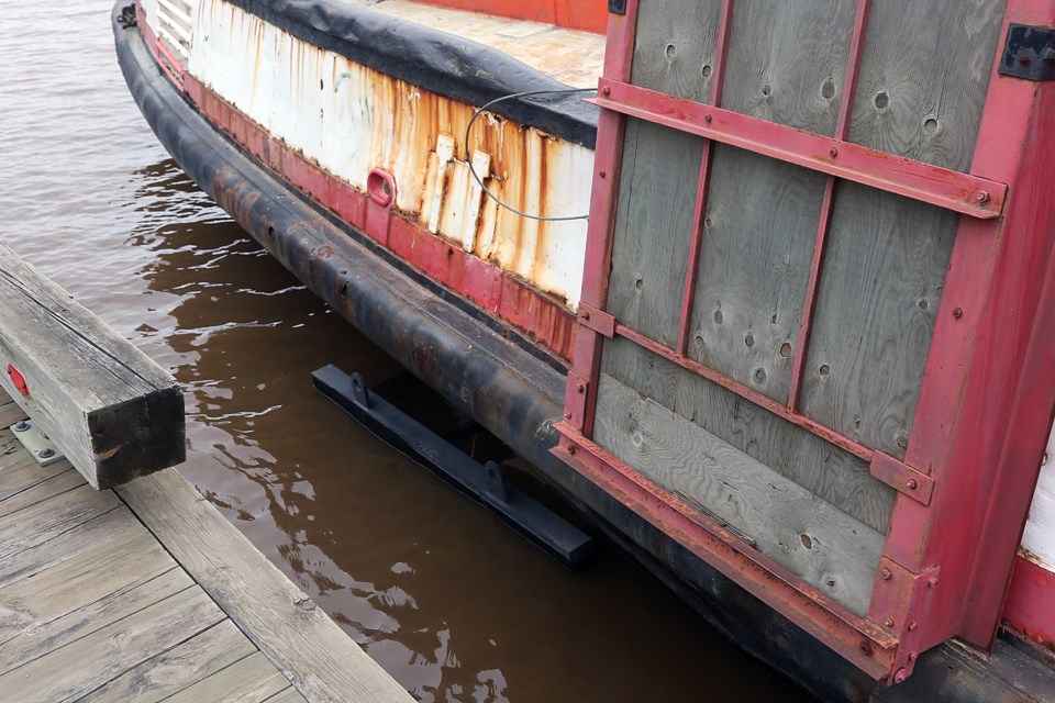 The anchoring system mooring the James Whalen Tugboat to a dock at the Kam River Heritage Park appears to have broken free. (Leith Dunick, tbnewswatch.com)