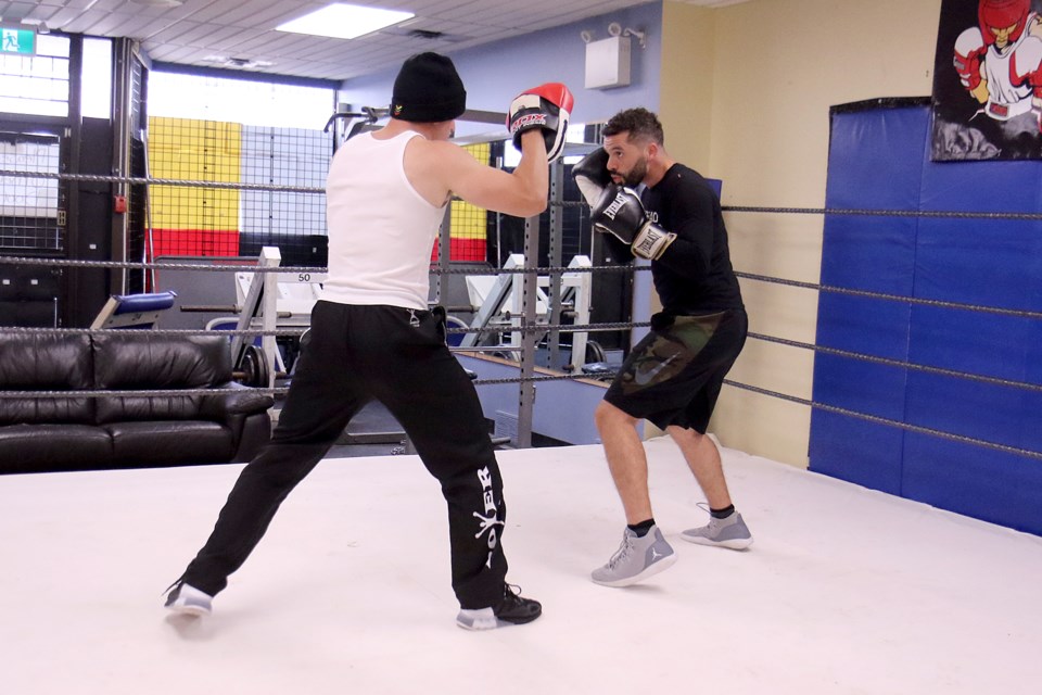 Hamza Hatoum of Big Brother Canada fame spars with Nathan Smallwood. He is taking on Big Brother star Jozea Flores in a celebrity boxing match on Aug. 6. (Leith Dunick, tbnewswatch.com)