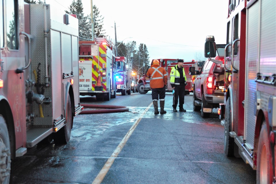 A fire at a home on Market Street drew a heavy response from Thunder Bay Fire Rescue on Friday. (Photos by Ian Kaufman, TBNewswatch)