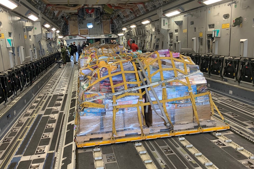 Several pallets of toys were delivered in the belly of a C-17 Globemaster, part of the Toys for the North program, on Thursday, Dec. 2, 2021. (Leith Dunick, tbnewswatch.com)