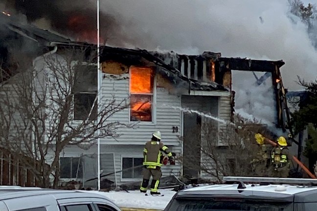 Firefighters respond to a house fire in Marathon Thursday. (Submitted photos)