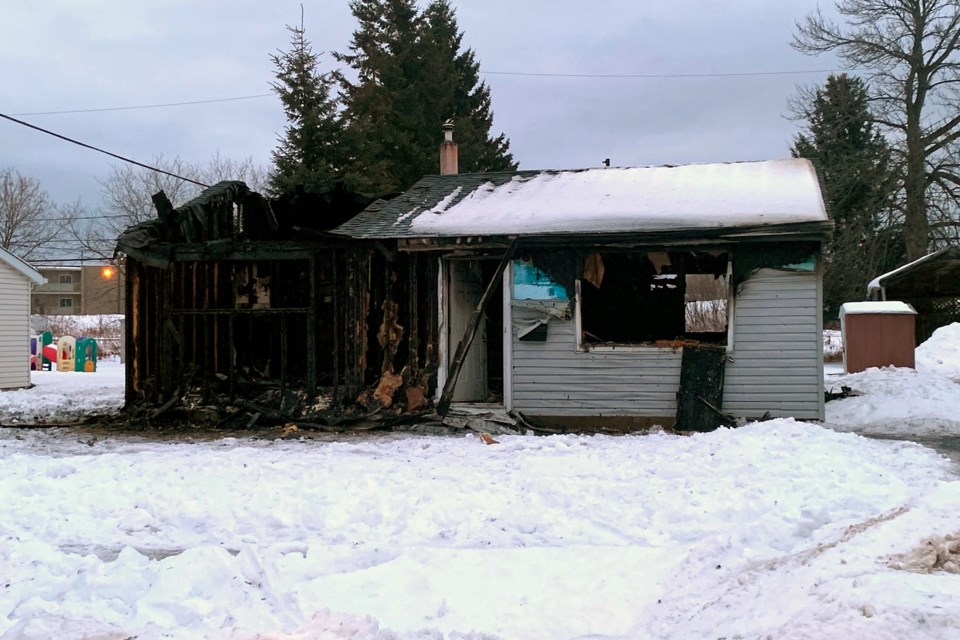 An early morning fire caused extensive damage to a south side home on Monday. (Leith Dunick, Tbnewswatch.com)