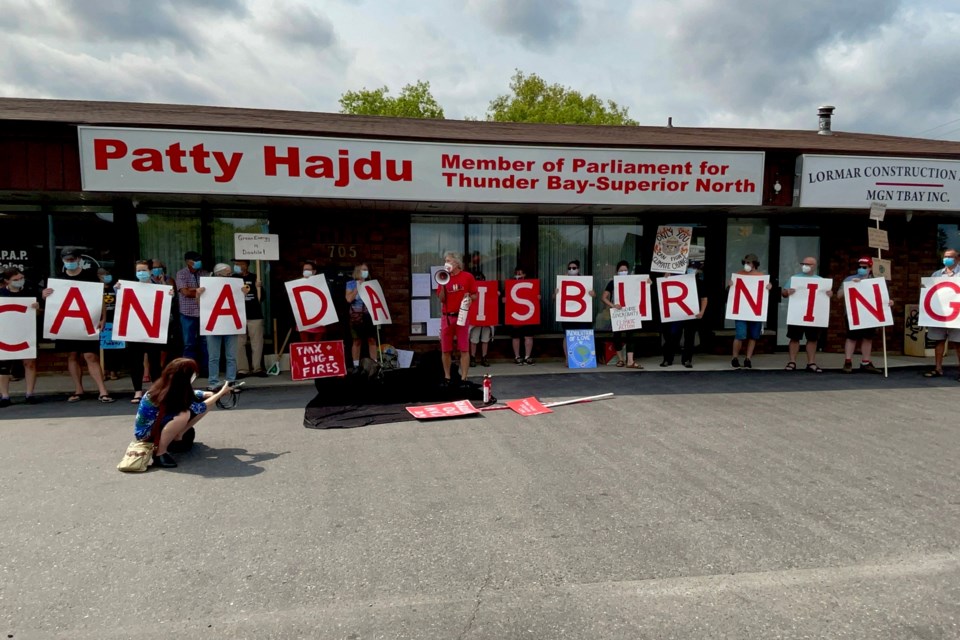 Rally outside of Patty Hajdu's office as part of a national day of action raising the alarm on the urgent need for Canada to increase its climate ambition. (Justin Hardy / tbnewswatch.com)