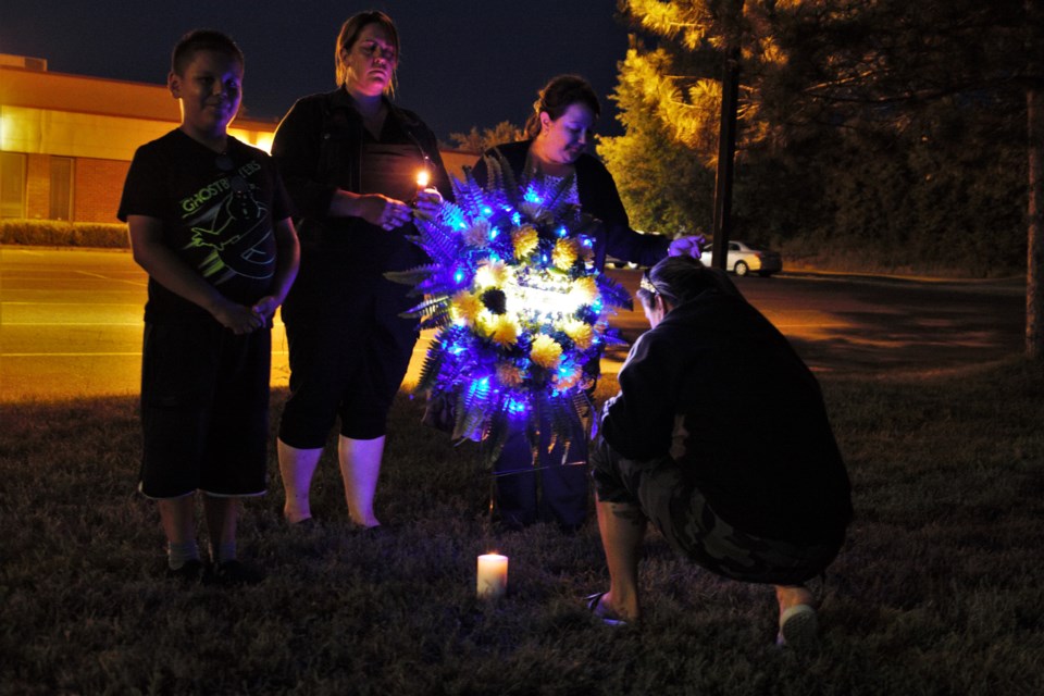 Morgan Stanley, Misty Bjorklund, Sonya Wiens, and Tiffany Byers-Stanley of Everest funeral chapel paid tribute to Kody Furioso as part of a vigil Saturday. (Photos by Ian Kaufman, TBNewswatch)