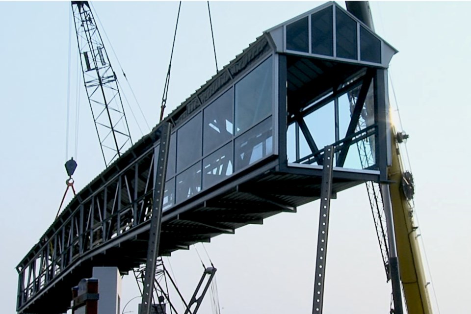 A section of the Water street overpass being lifted into place (Kurt Black / TBTNews)