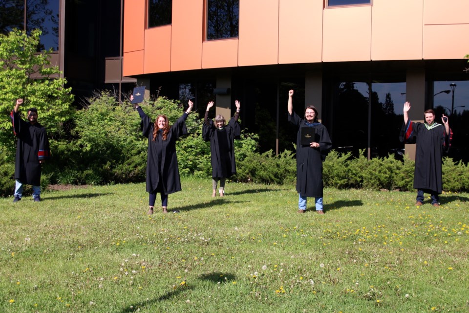 A small in-person ceremony was held for two students selected by their classmates before a virtual convocation ceremony was held Friday afternoon. (Photos by Doug Diaczuk - Tbnewswatch.com). 