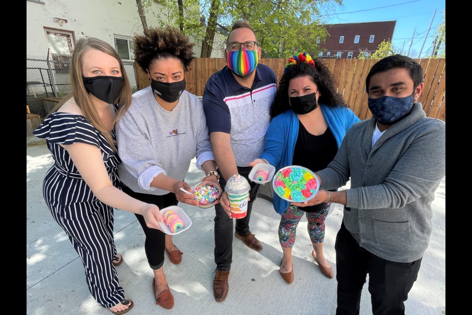 Erikka Mikkola, Colleen Peters, Jason Veltri, Annalicia Kaban, and Vignesh Viswanathan show off some of the sweets being sold for a good cause as part of Dessert Days. (Submitted photo)