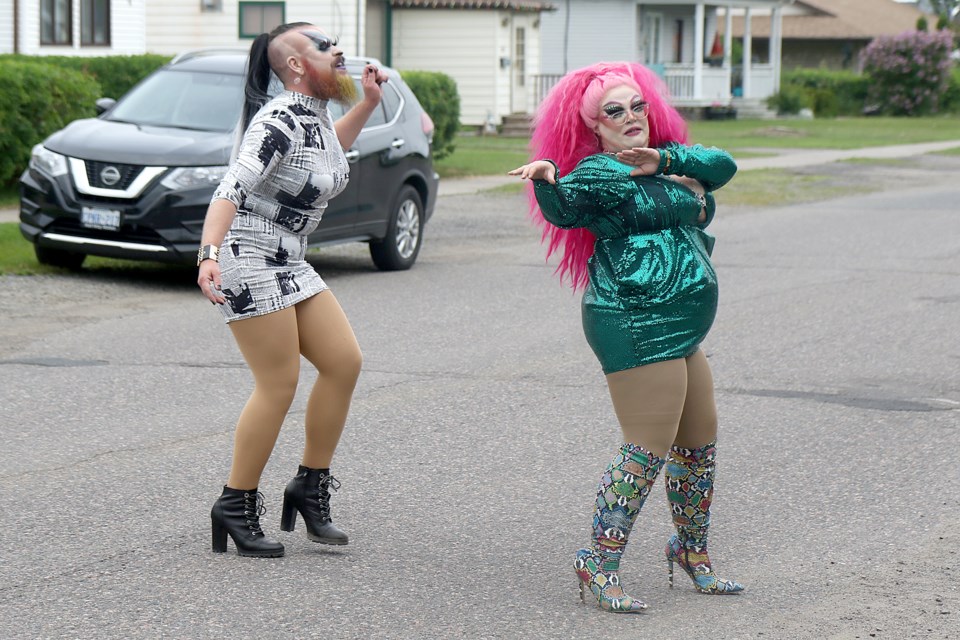Amber Ail and Mz. Molly Poppinz take part in Drive by Drag on Saturday, June 26, 2021 on Dacre Street in Thunder Bay. (Leith Dunick, tbnewswatch.com)