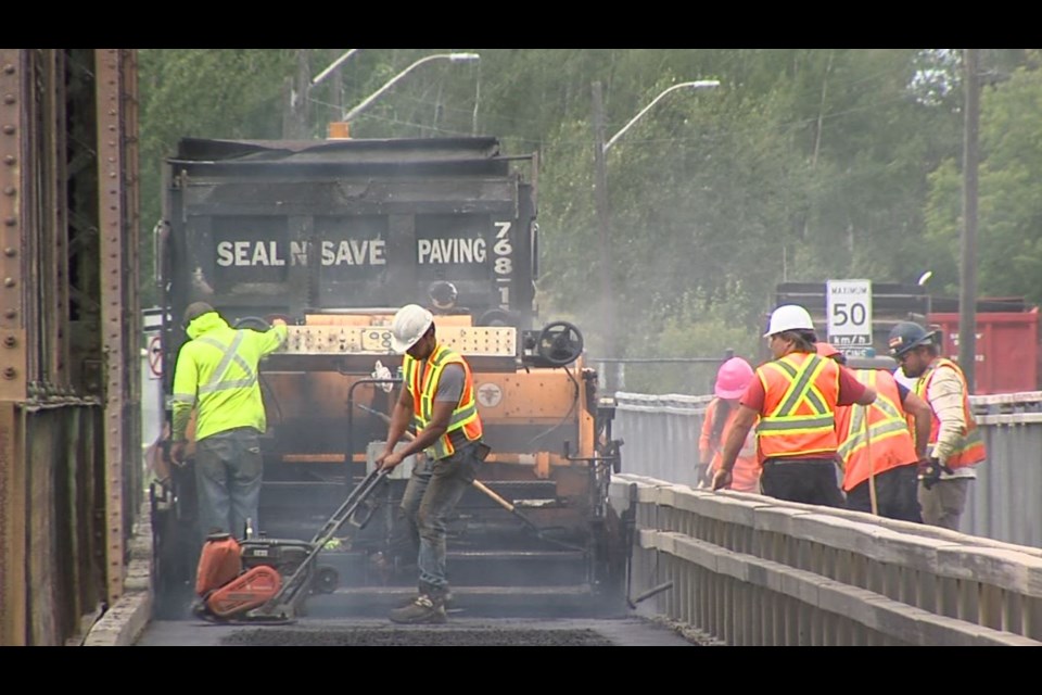 Repaving of the northbound lane of the James St. swing bridge was completed late Wednesday (Vasilios Bellos/TBTV photos)