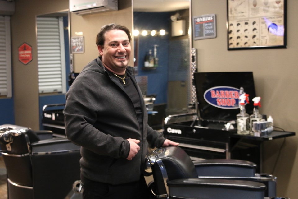 Bryan Fresco, owner of The Barber Shop in Westfort, is excited to get back behind the chair and cutting client's hair. (Photos by Doug Diaczuk - Tbnewswatch.com). 