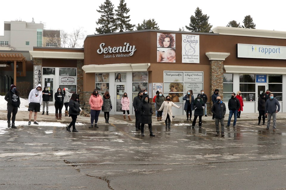 About 30 members of the personal-service industry came together on Tuesday, March 1, 2021 to protest what they say are unfair lockdown rules in Thunder Bay. (Leith Dunick, tbnewswatch.com)