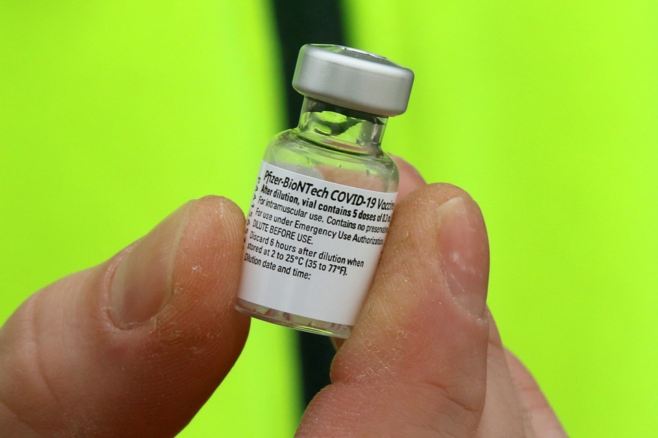 Pfizer vaccine bottle (Leith Dunick, tbnewswatch.com)