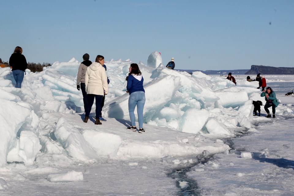 Crowds gather on Saturday, March 6, 2021 near Mary Island, on Lake Superior, to see the blue ice near Silver Harbour Conservation Area. (Leith Dunick, tbnewswatch.com)