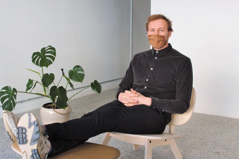 Tok Tok Home president Matej Rodela reclines in the company's Sibley lounge chair. (Photos by Ian Kaufman, tbnewswatch.com)