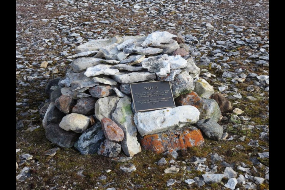 Commemorative cairn at Erebus Bay constructed in 2014. The cairn contains the remains of John Gregory and two other members of the 1845 Franklin expedition. (Photo by Diana Trepkov). 