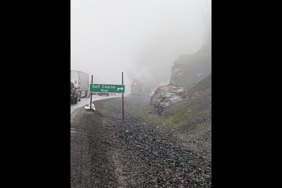 Smoke streams from a tractor-trailer that caught fire on Highway 17 near Nipigon Friday. (Submitted photo)