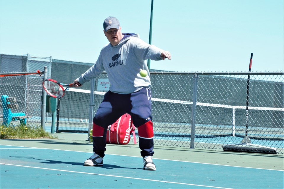 Tennis Club member Pasi Pinta was thrilled to be back on the court Sunday. (Ian Kaufman, TBNewswatch)