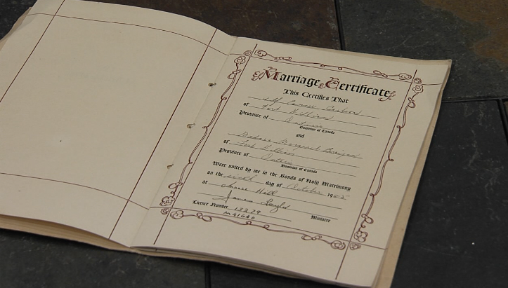 The documents included the marriage certificate and guest list of Dolly and Alf Carlson from October 1945 (Alex Flood/TBTV photo)