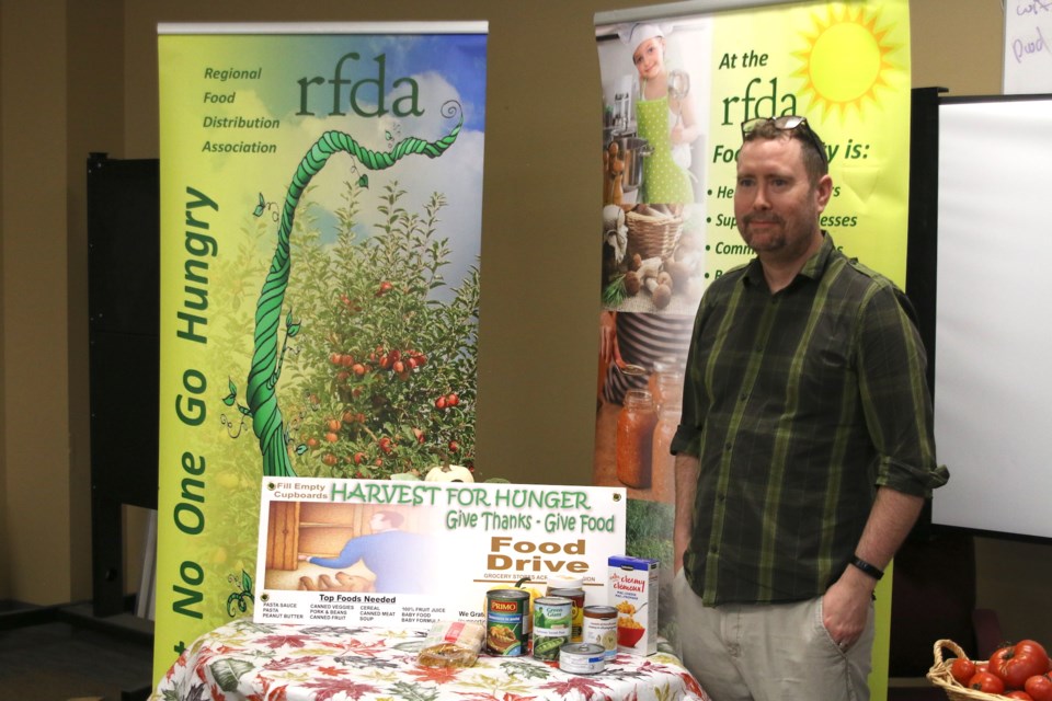 Brendan Carlin, community service manager with the RFDA, said demand remains high for food banks, which is why the Harvest for Hunger food drive will not only help bring in donations, but raise awareness that access to food is a year-round need. (Photos by Doug Diaczuk - Tbnewswatch.com). 
