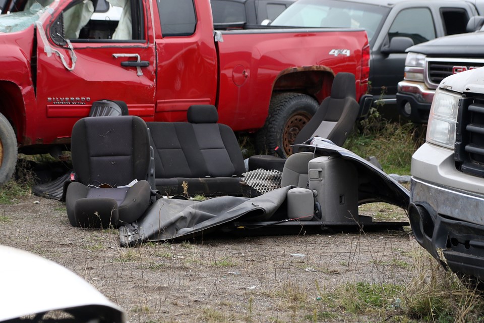 A makeshift campfire can be seen at a vehicle scrapyard on Simpson Street. (Leith Dunick, tbnewswatch.com)