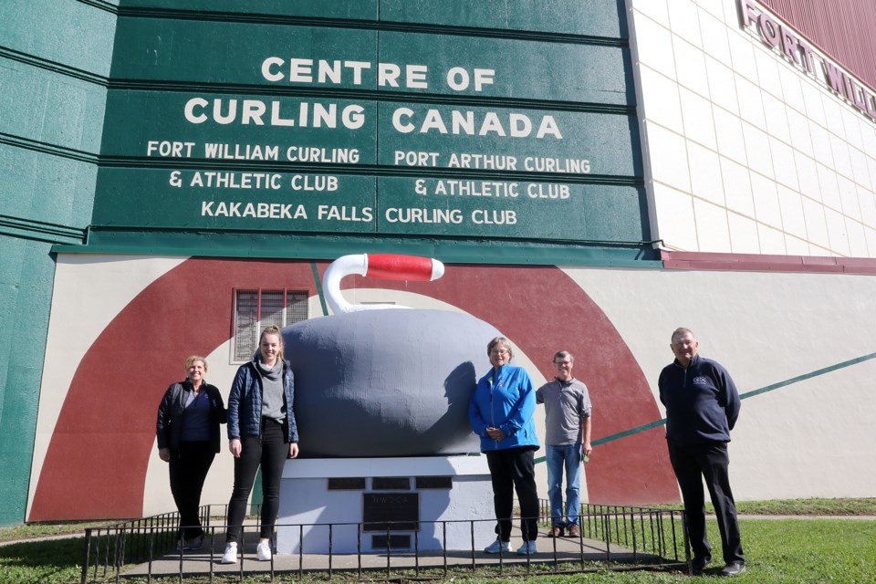 Curling Canada's Marcy Hrechkosy (from left) and Maddie Kelly join Scotties Tournament of Hearts local organizing committe members Diane Imrie; Rick Lang and John Cameron on Wednesday; Sept. 22; 2021 outside Fort William Gardens. (Leith Dunick; tbnewswatch.com)