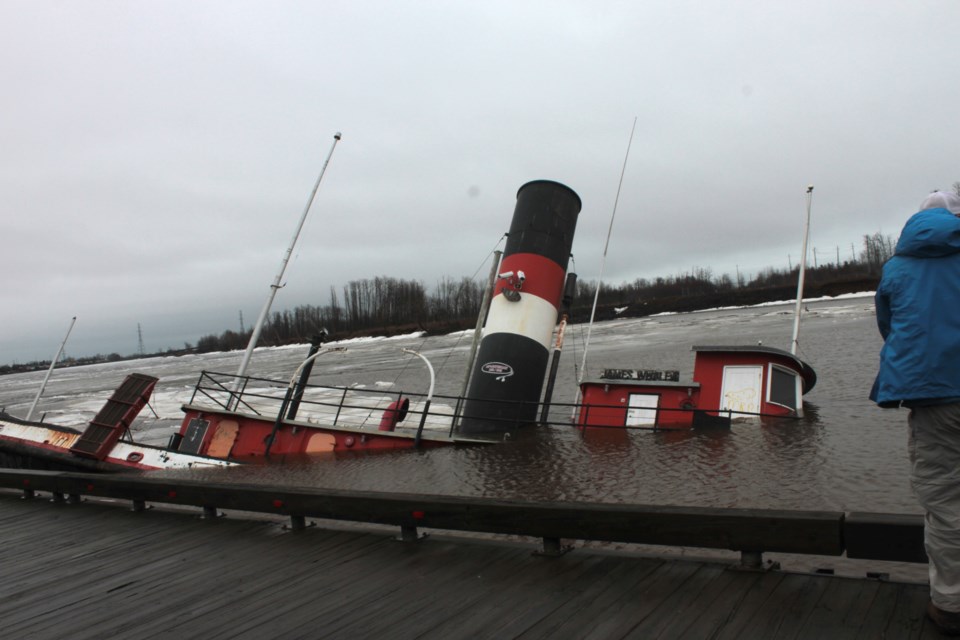 The 117-year-old vessel is fully submerged in the Kaministiquia River