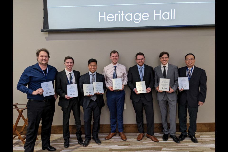 From left, Philip Duke, Matthew Scott, Damien Grayda, Paul Graham, Felix Lasalle, and Cory Hubbard (technologist), Dr. Yanglin Gong (faculty advisor) won first place at the regional competition.