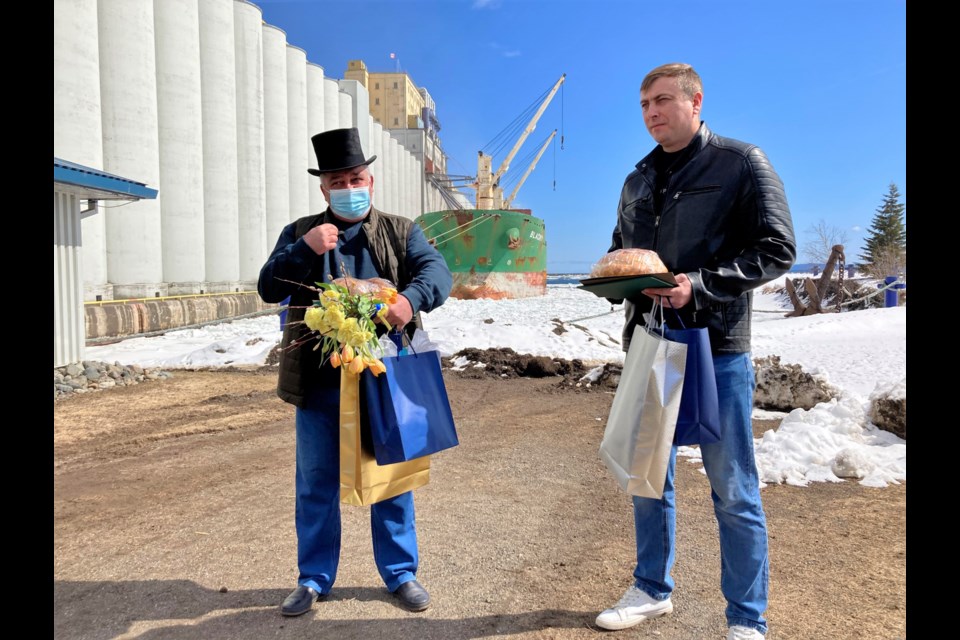 Captain Oleg Gerasymchuk and first engineer Igor Matsala of the MV Blacky accepted top hat honours during a ceremony at the Richardson Elevator on Tuesday.