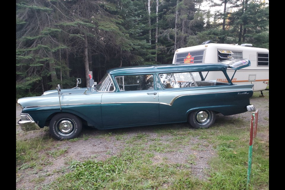 A 1958 two-door Ford Ranch Wagon  was one of the vehicles parked at Trowbridge Falls Campground during a stopover for the Canadian Coasters tour  in Thunder Bay (TBnewswatch)