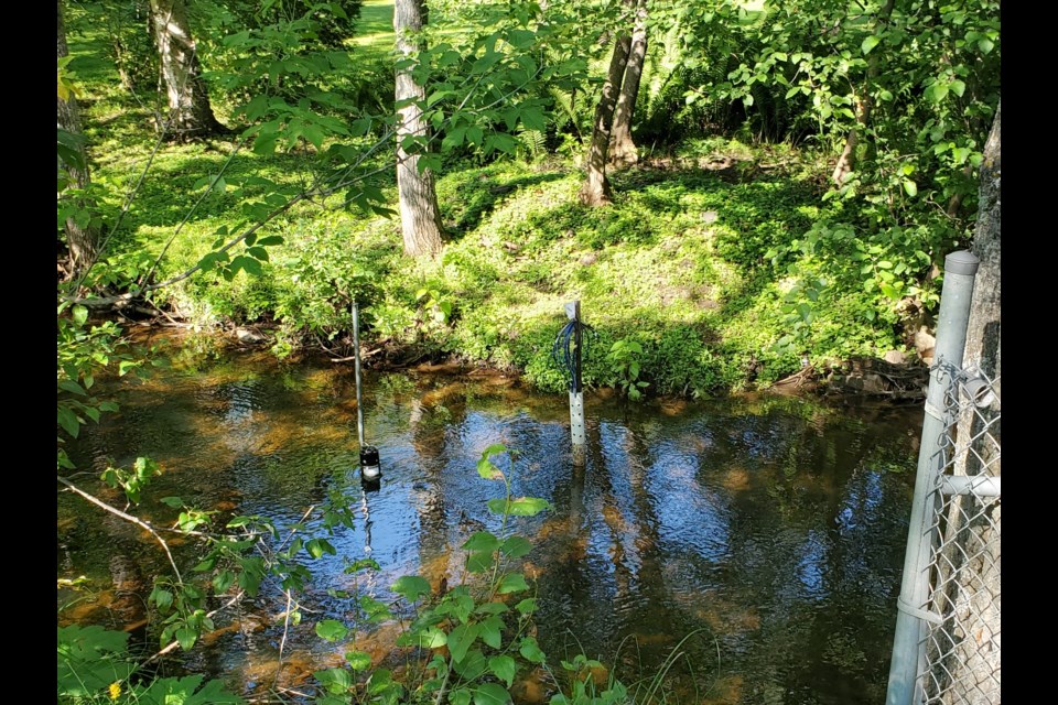 Monitoring equipment that's been installed in McVicar Creek will help PhD student Brant Muir study the effectiveness of bioretention facilities in the McVicar Creek and Current River watersheds (TBnewswatch photo)