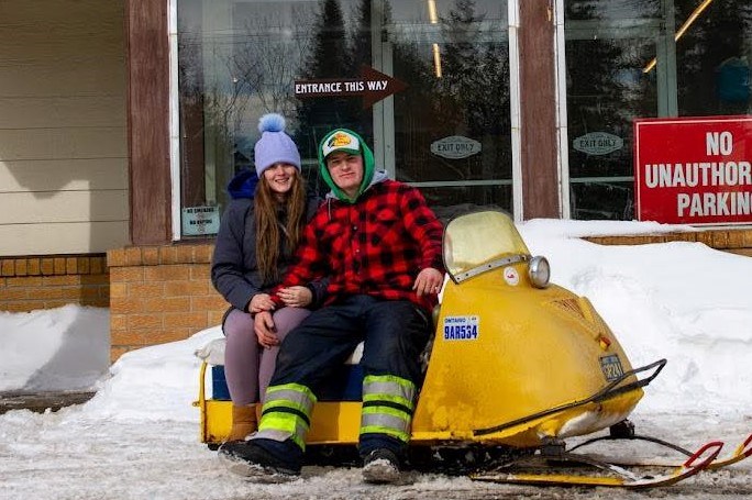 Christian Ward (right) founded the Lappe Vintage Snowmobile group, which held a show at Dawson General Store on Feb. 25, 2022 (submitted photo)