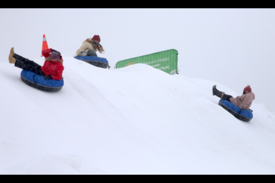 Staff at Fort William Historical Park test out the popular sledding hill before the start of Family Day activities all weekend. 