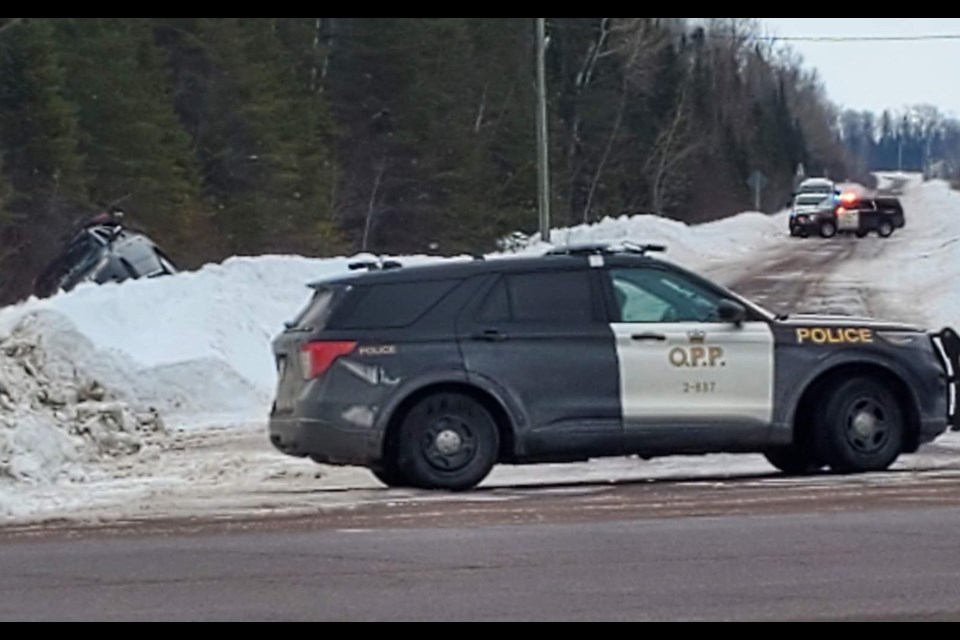 OPP officers exchanged gunfire with a male shooting suspect driving the vehicle seen in the upper left corner of this image around 4 p.m. on Tuesday, March 8, 2022, according to preliminary reports from Ontario's SIU. (Adam Riley, TBNewswatch)