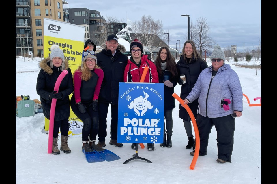 Organizers of the Polar Bear Plunge along with representatives from the supported charities brave the cold to announce the return of the polar bear plunge 