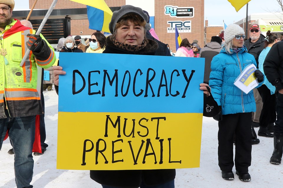 More than 200 people turned out on Saturday, Feb. 26, 2022 for a rally for Ukraine at Thunder Bay city hall. (Leith Dunick, tbnewswatch.com)