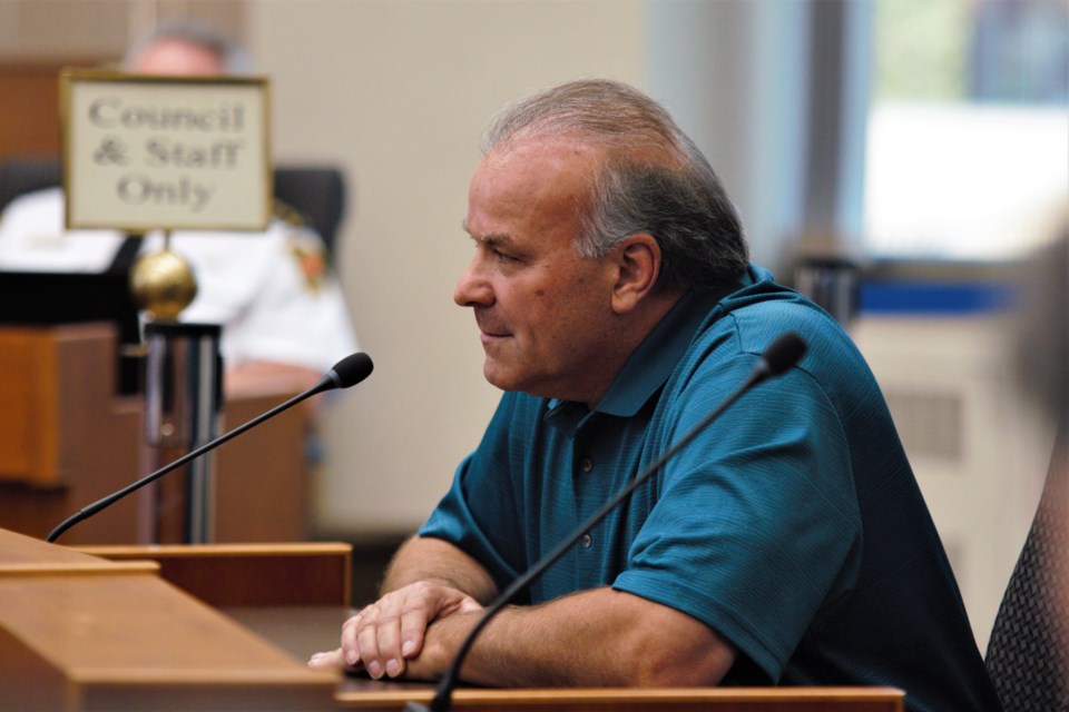 Developer Robert Zanette answered questions about a proposed hotel and office development at city council on Monday. (Ian Kaufman, TBnewswatch)